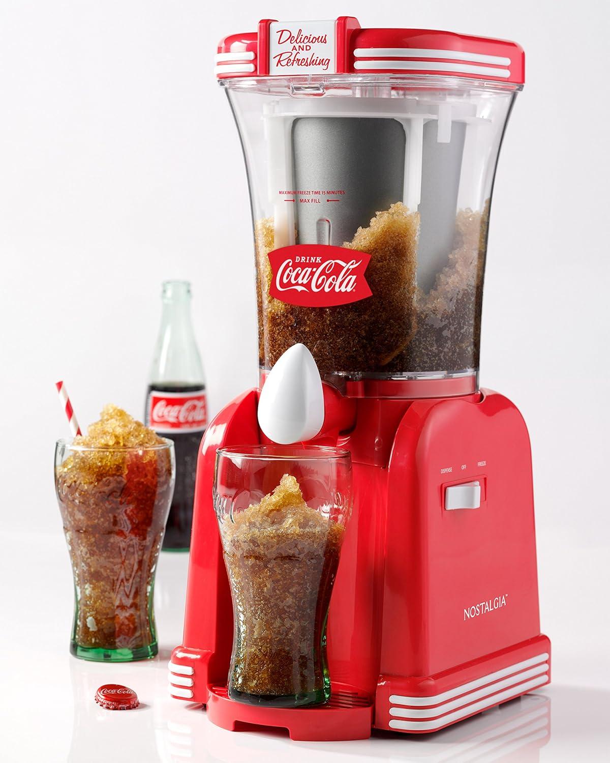 image:imageNostalgia KoolAid Slush N Go Personal Blender for Smoothies Slushies Shakes and Fruit Blends Includes Two 15 Oz Travel Bottles Cup Lid and Reusable Straw Blue32Ounce Frozen Drink Maker Coke